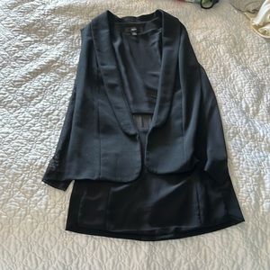 Womens long, sleeveless, suit jacket/vest